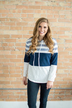 Load image into Gallery viewer, Model smiling wearing striped hoodie